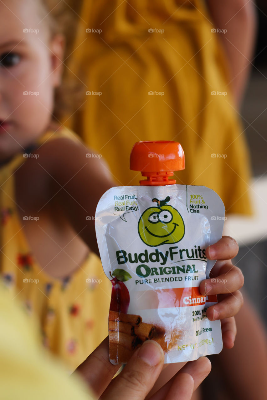Parents and kids enjoying Buddy Fruits