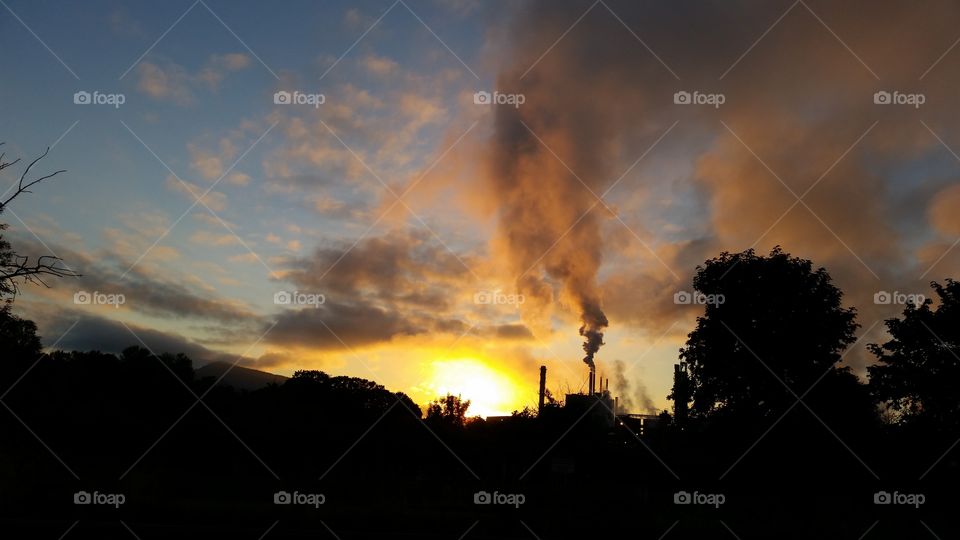 high contrast industrial sunrise