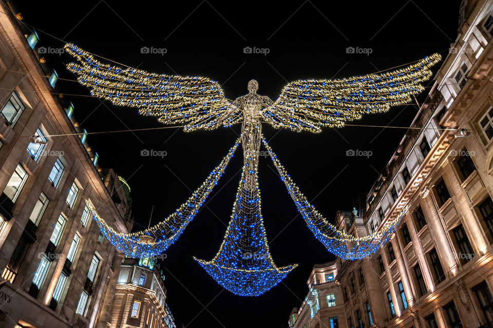 Angel Christmas decoration in Regent Street. December 2019. London. UK.