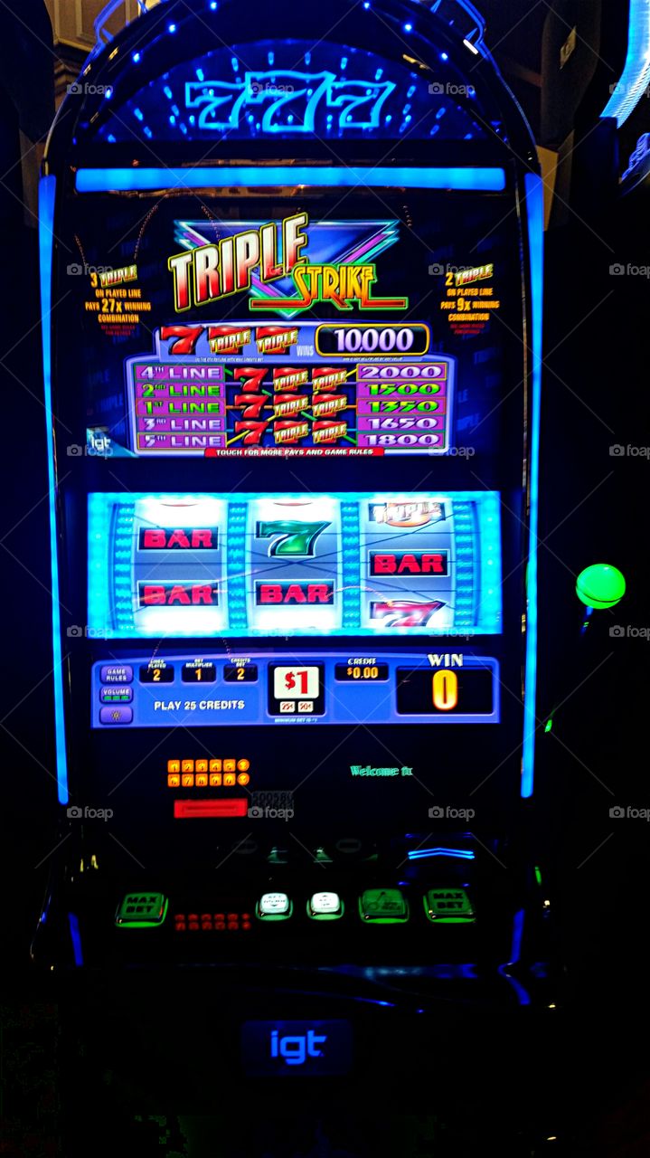 Slot Machine with lighted handle.