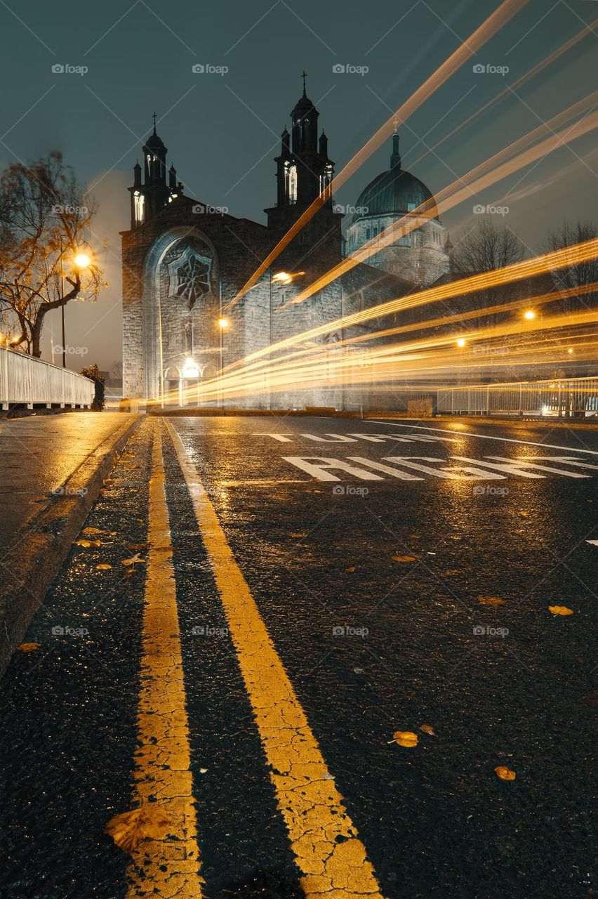 Galway cathedral with car light trails