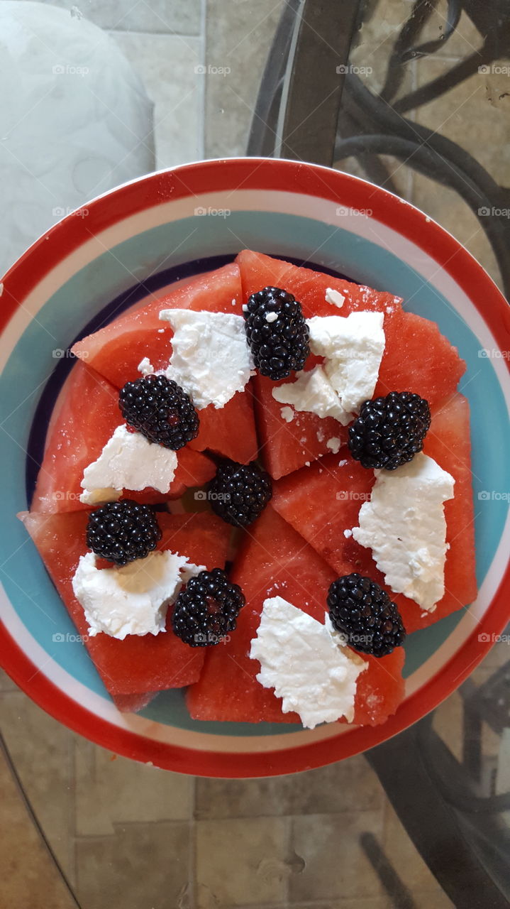 Watermelon, white cheese and blackberries