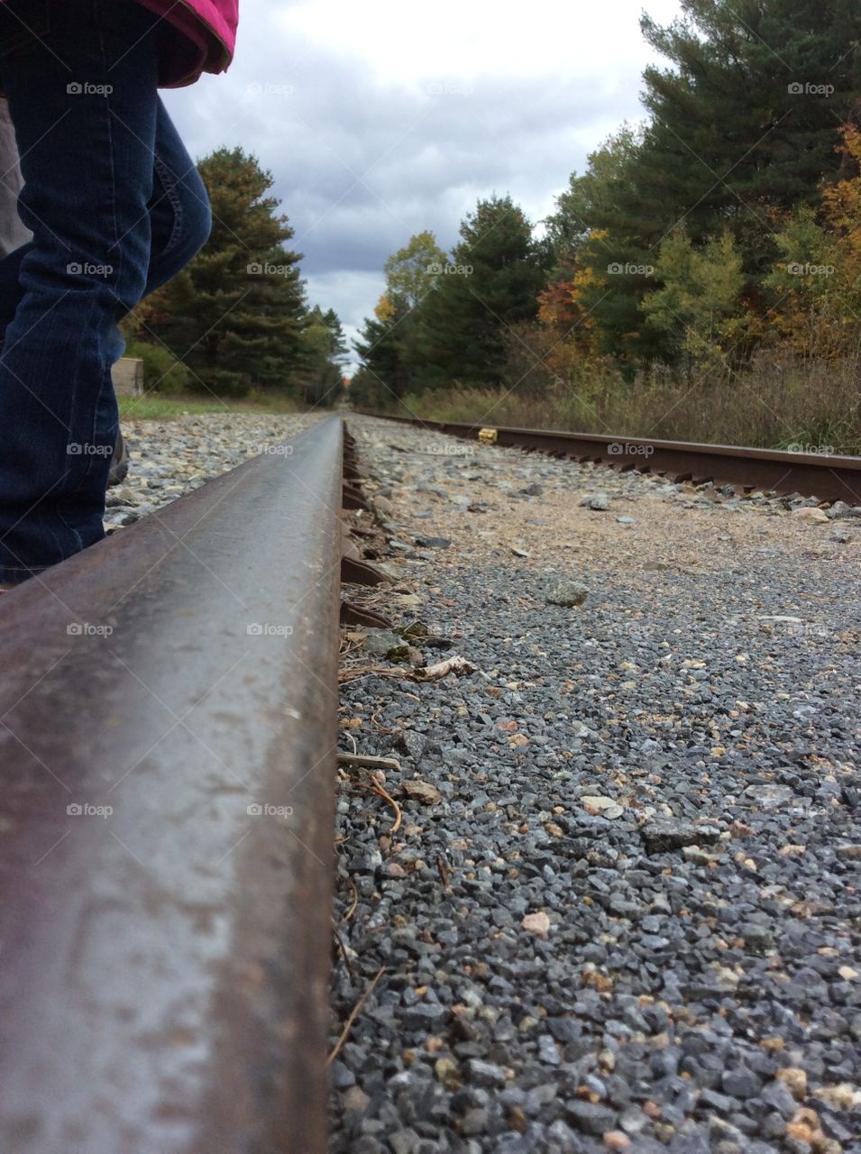 Walking by train tracks 