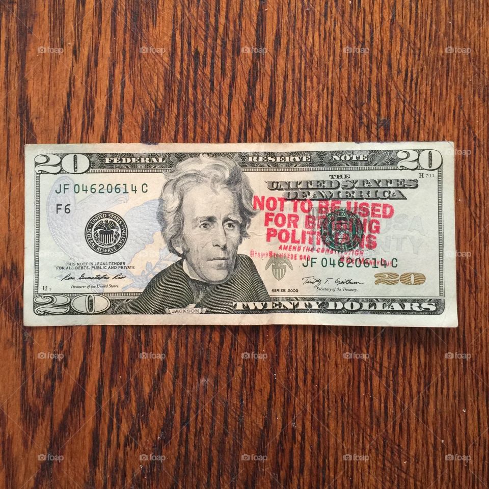 TWENTY dollar bill with marking