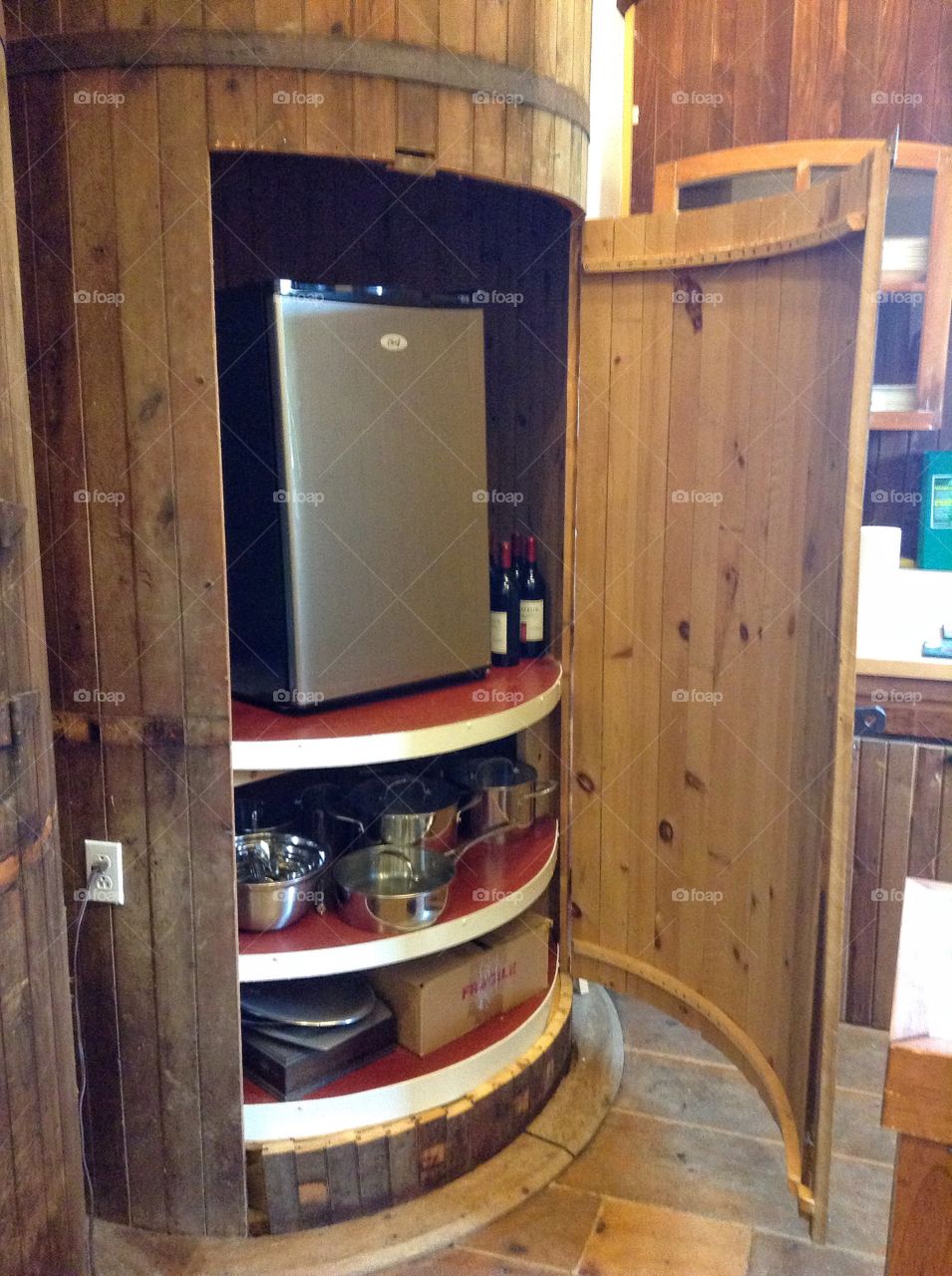 Fridge and extra storage space in an old feed mill that is now half store/art gallery and half private home. 