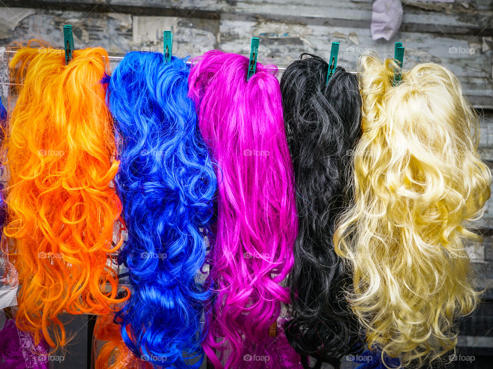 different color wigs in the streetmarket