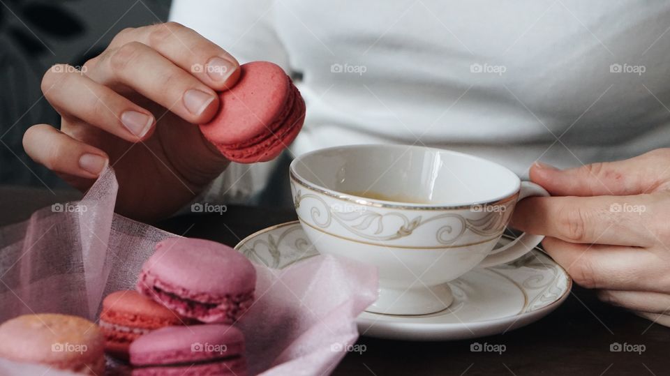 Close-up of woman's hand doing her breakfast