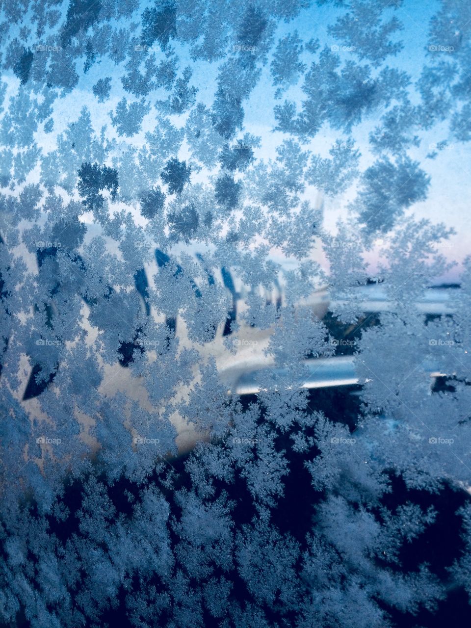 Finnair airplane through a Frozen glass 