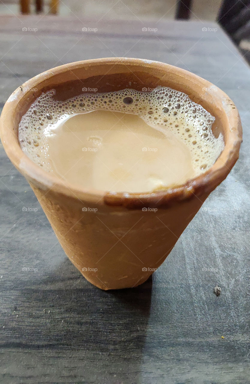 Kullhad is basically a mud made cup used in most of the regions of india for having tea .It tastes very good and smell is so nice that no one refuses to drink tea in KULLHAD