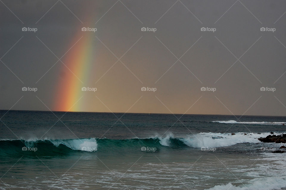 Rainbow at Poipu Beach, Kauai, Hawaii