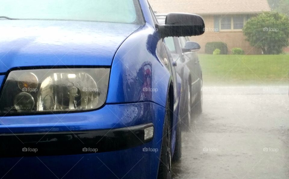 Volkswagen Jetta and pouring rain