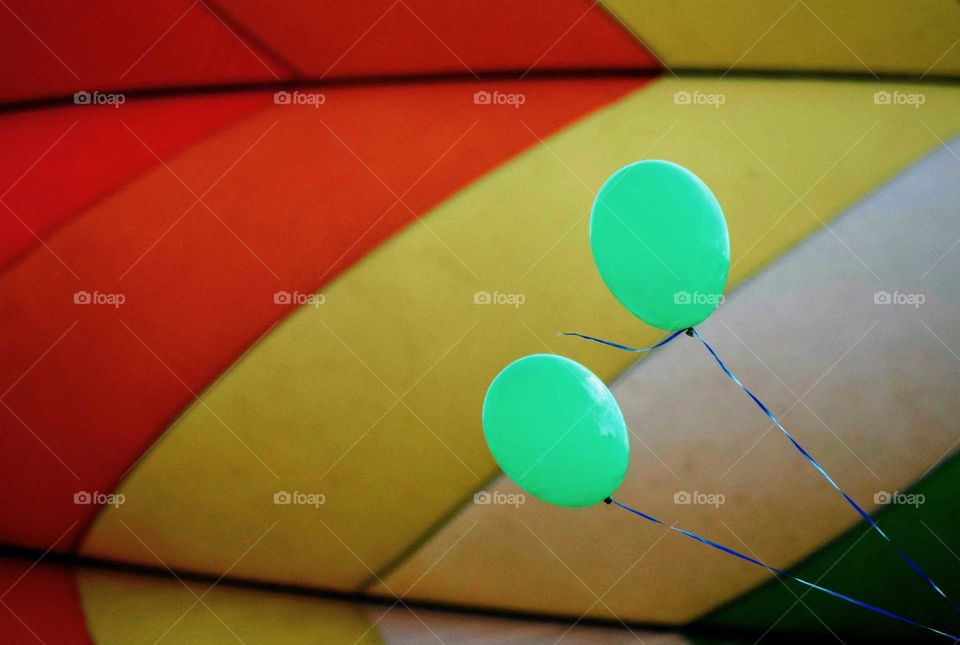 Two Balloons and One Hot Air Balloon