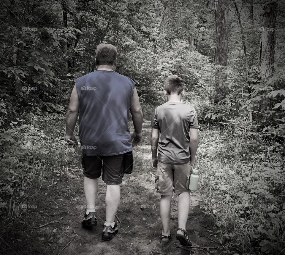 Father and son quality time hiking 