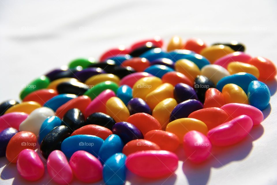 Jelly beans form a perfect ellipsis in this picture. So bright and colourful. And the sweet sensation!