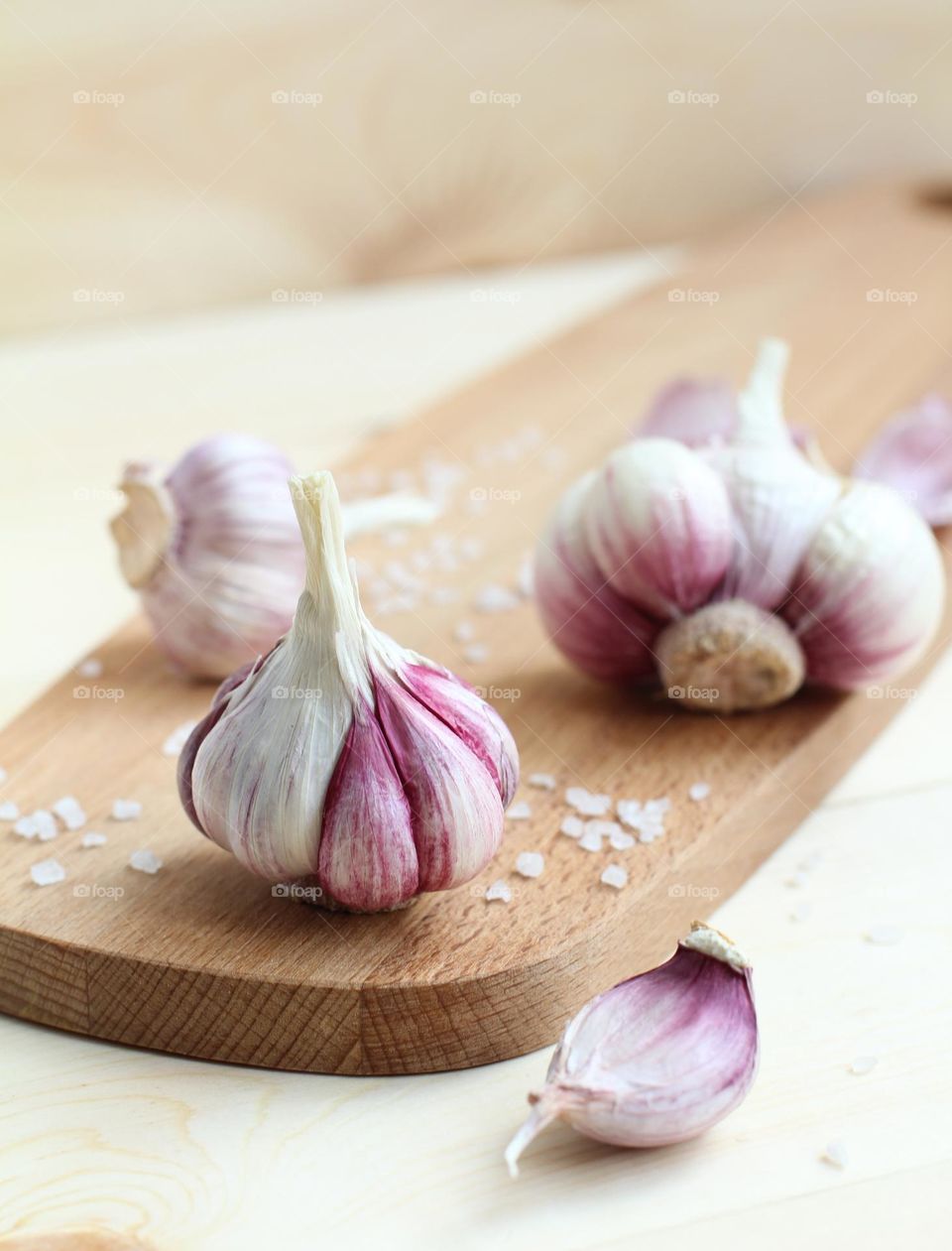 Fresh garlic on a wooden board