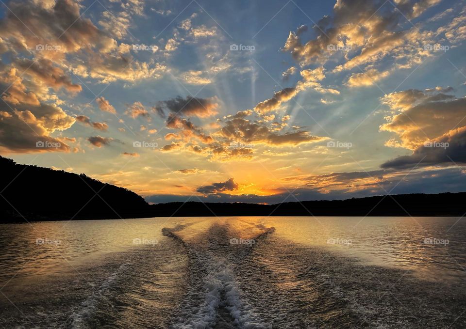 Sunset on a lake with clouds