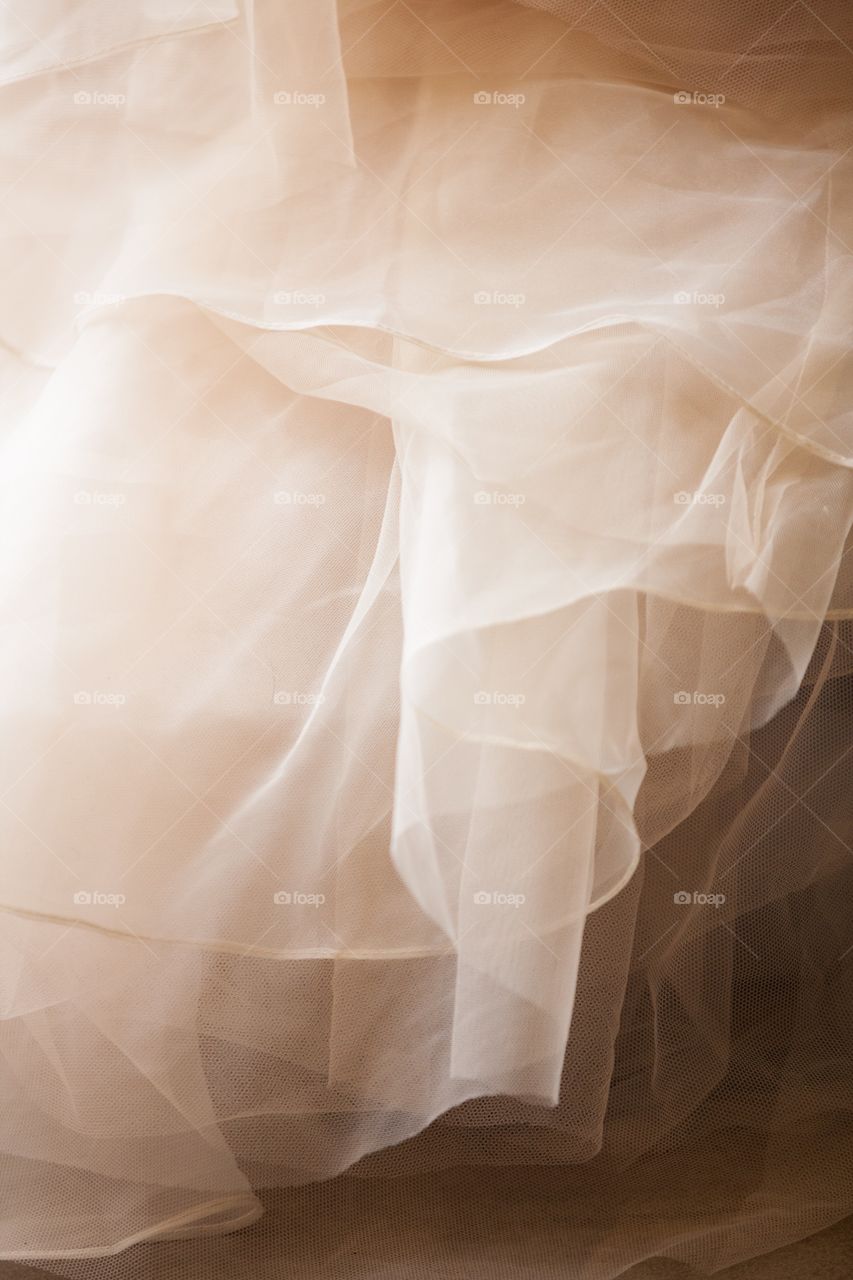 Ruffled tulle of a dress