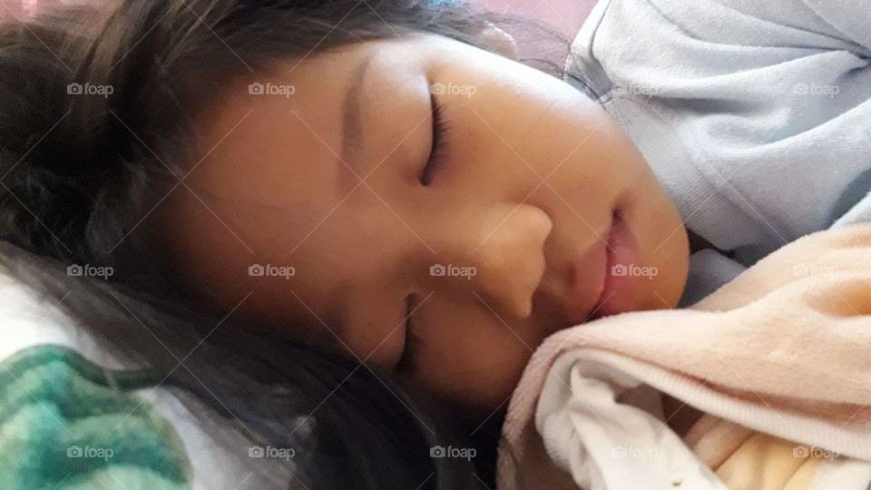 Close-up of a girl sleeping