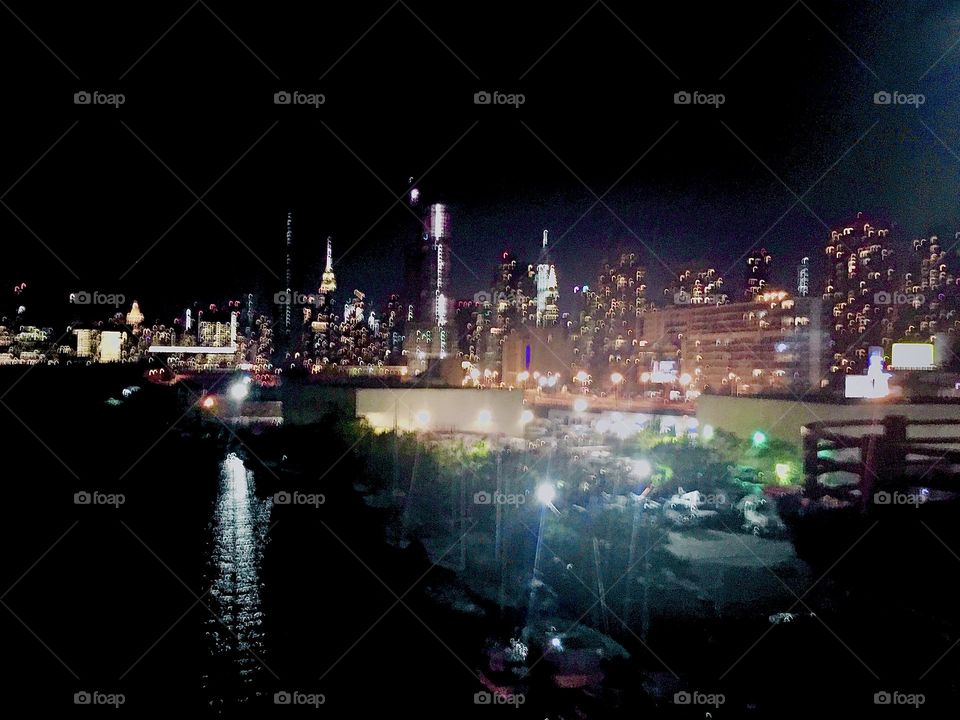 The lights of the city of LIC and of “Manhattan” shine on brightly at night and their reflections in the “East River” at “Newtown Creek” even double the sensation of the beautiful glittering electric pile we see. 2022. Hypnotic Productions