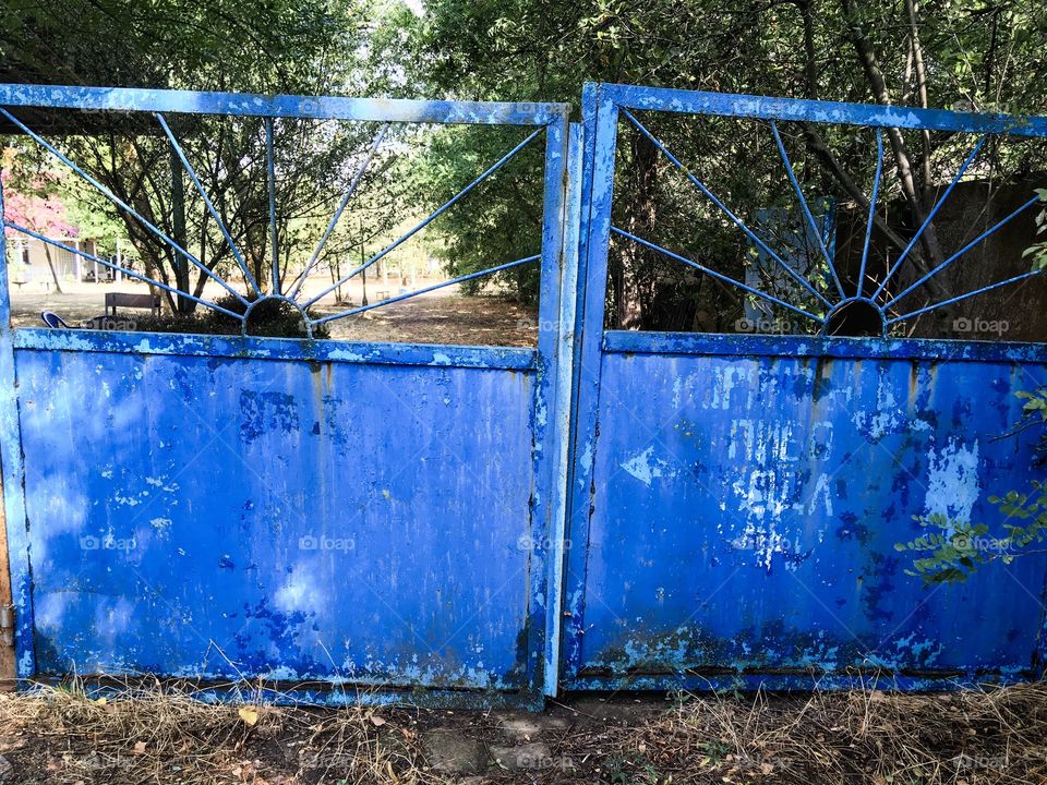 The old blue metal entrance goal. 