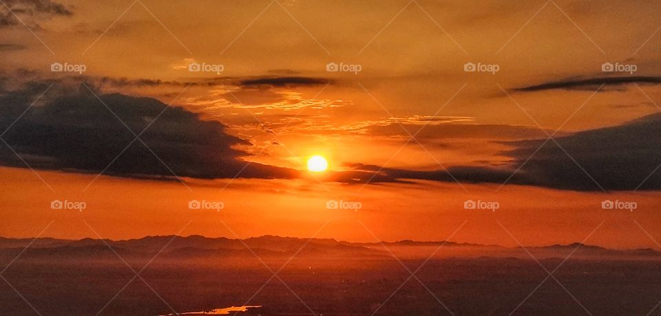 Camping outside and watching the sunrise,