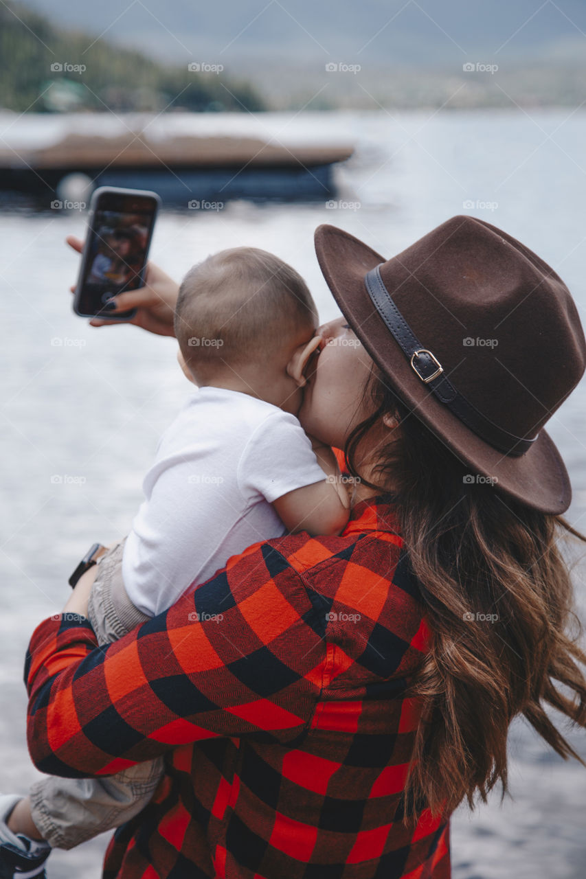 Mother and son taking a photo