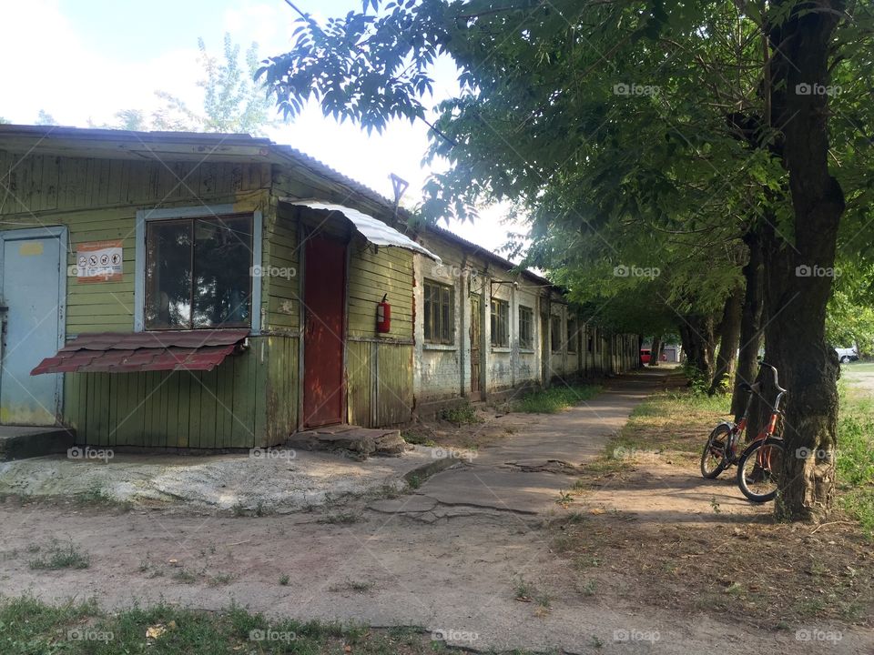 Bicycle near old dwellings