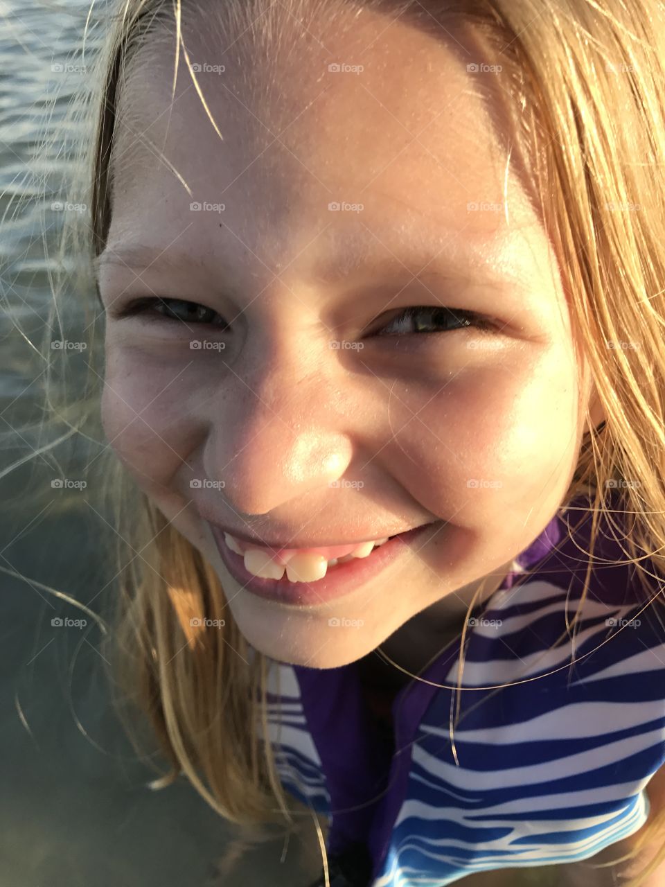 Little girl happy to be in the water