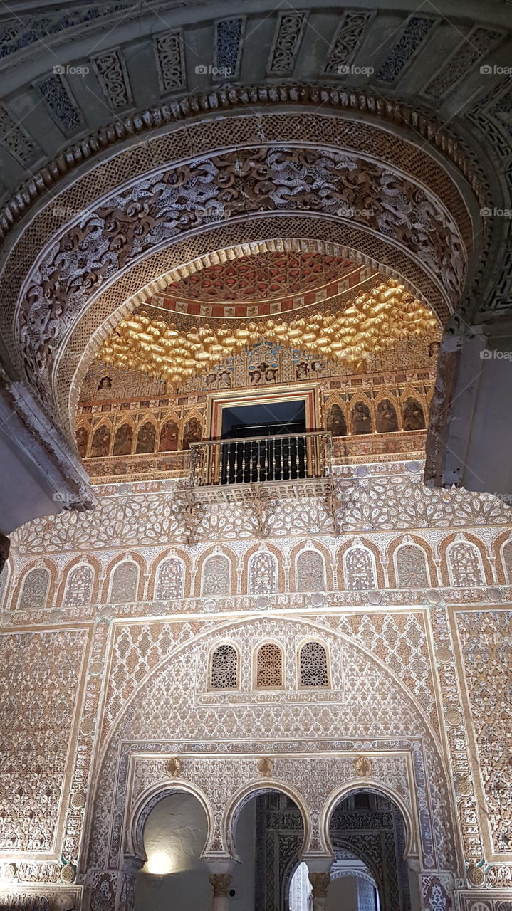 View of the salón de Embajadores from one of the horseshoe arches at the Real Alcázar in Sevilla