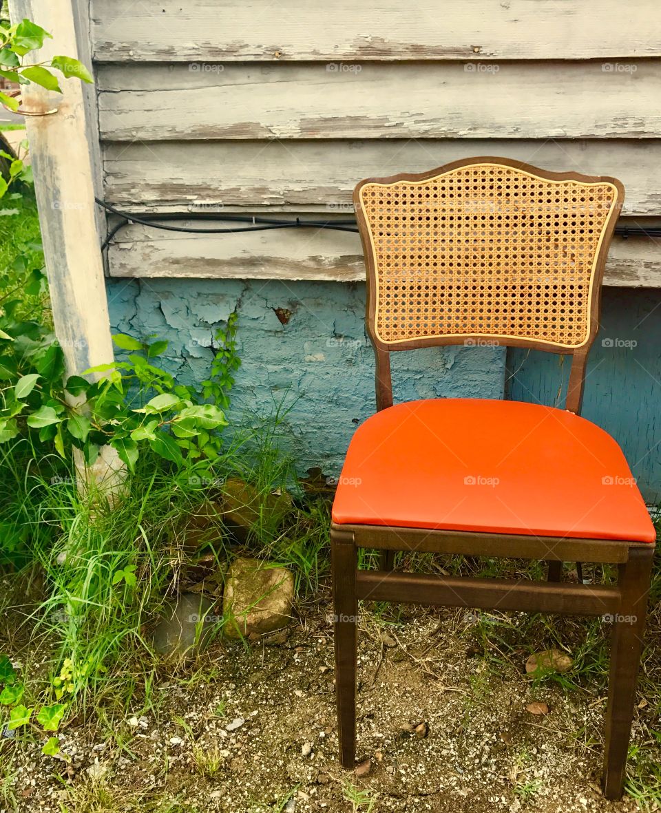 Orange Chair by Rain Spout