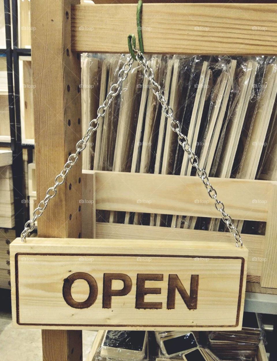 Open wood sign.