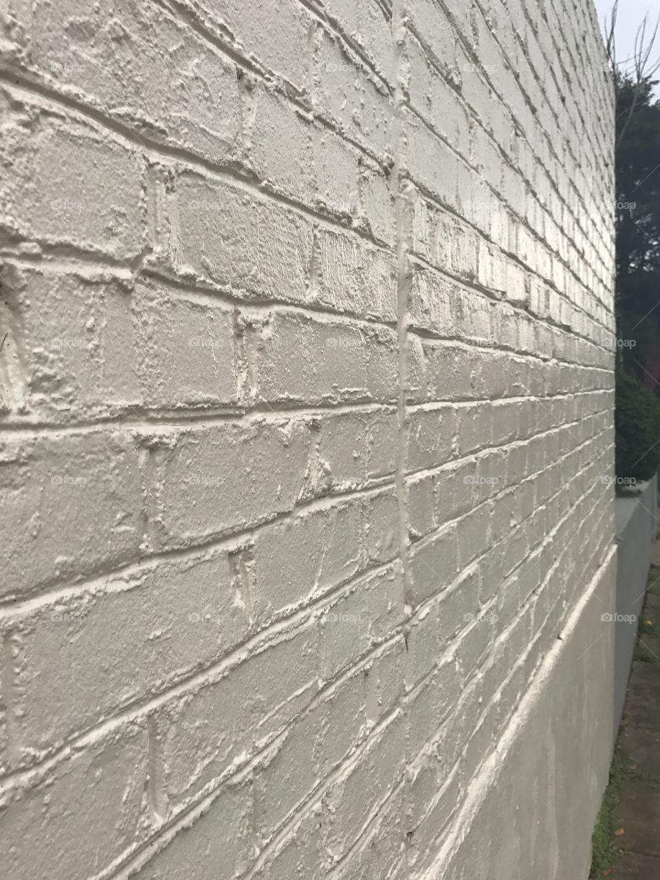 Side View White Brick Wall