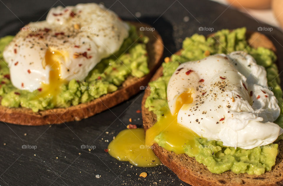 Smashed avocado with poached eggs