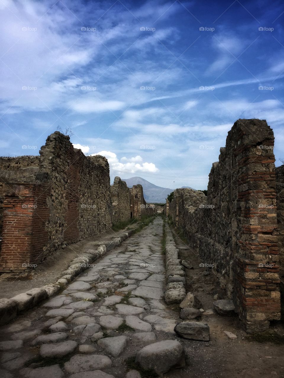 Cobblestone street in the ruins of Pompeii 