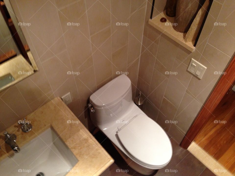 High angle view of toilet in new bathroom renovation in Queens NY