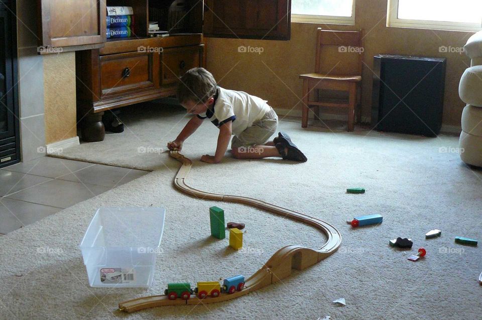 Boy playing trains