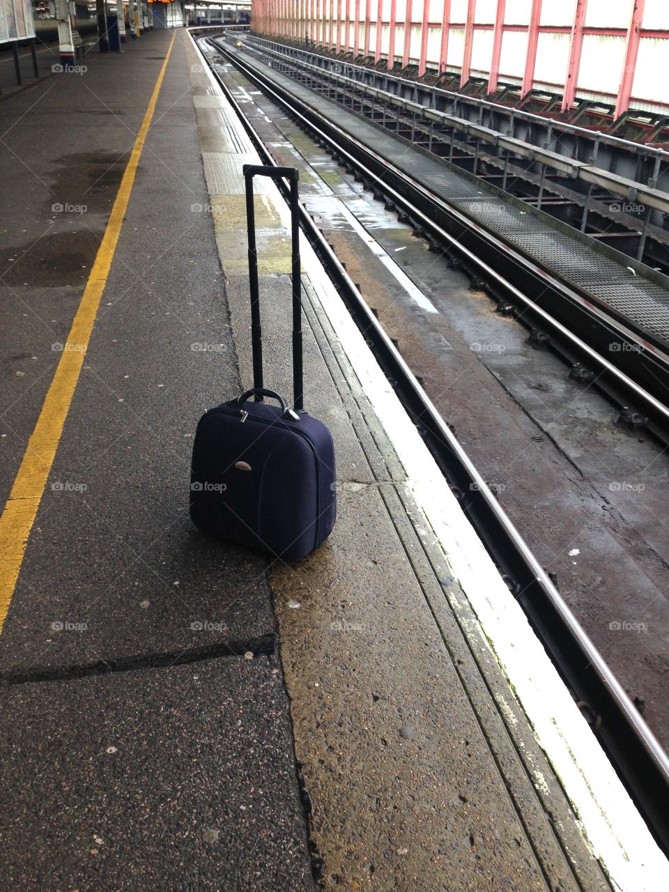 Suitcase train platform station