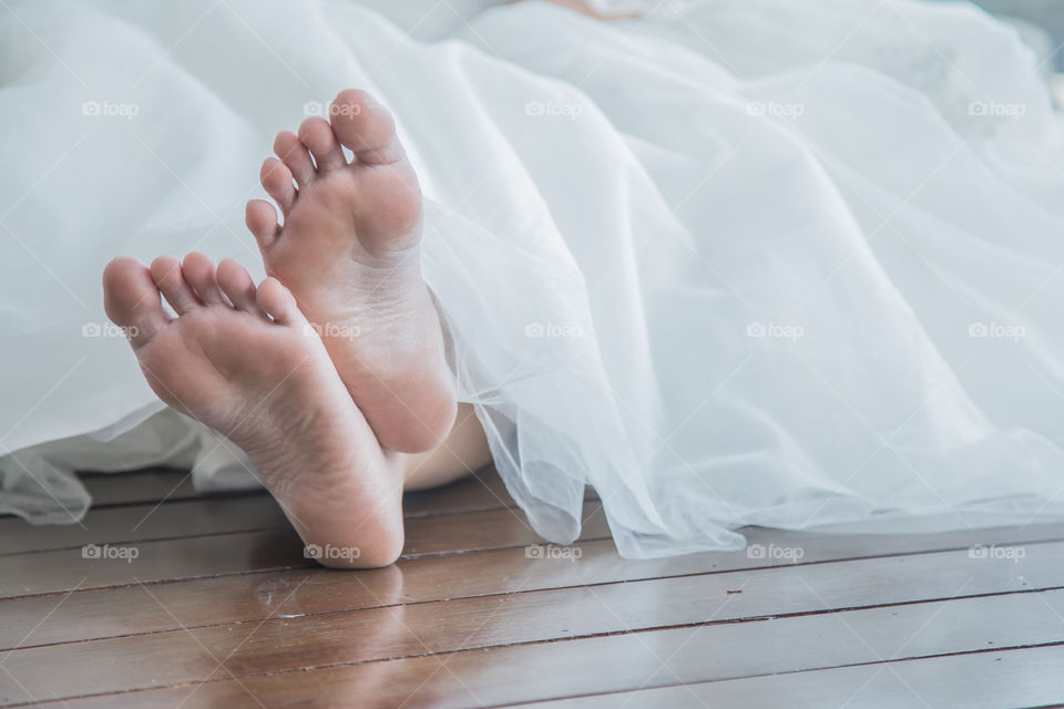 Close-up of bride's barefoot