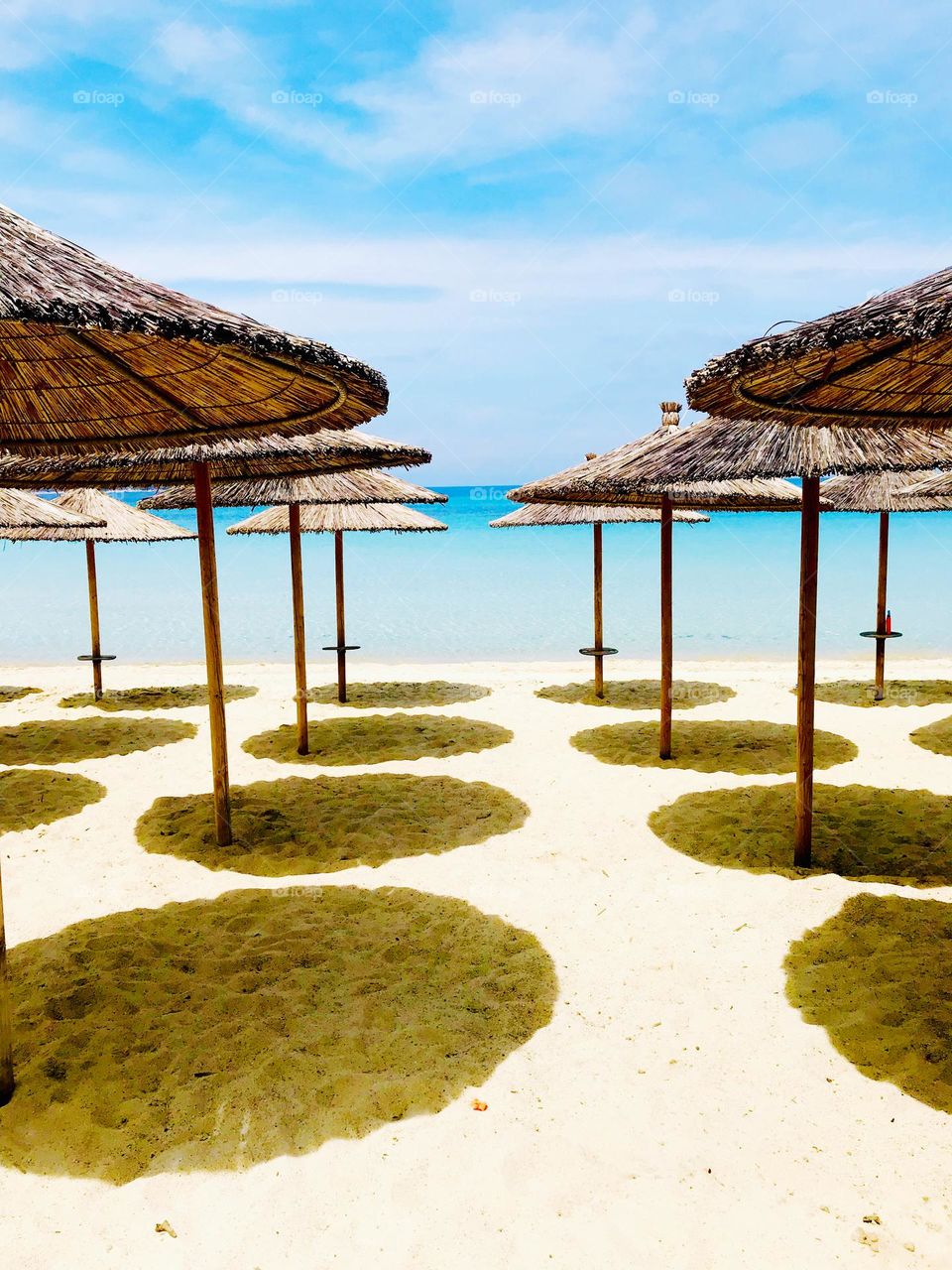 Umbrellas in a sunny day at the beach 