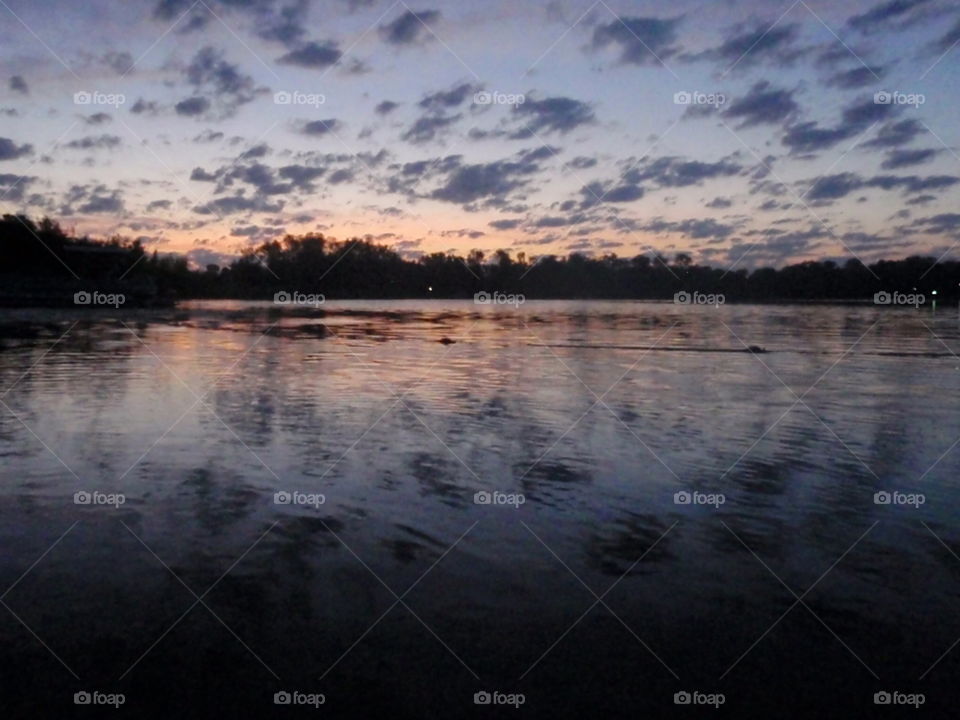 Reflection in the am. Sunrise reflected in lake