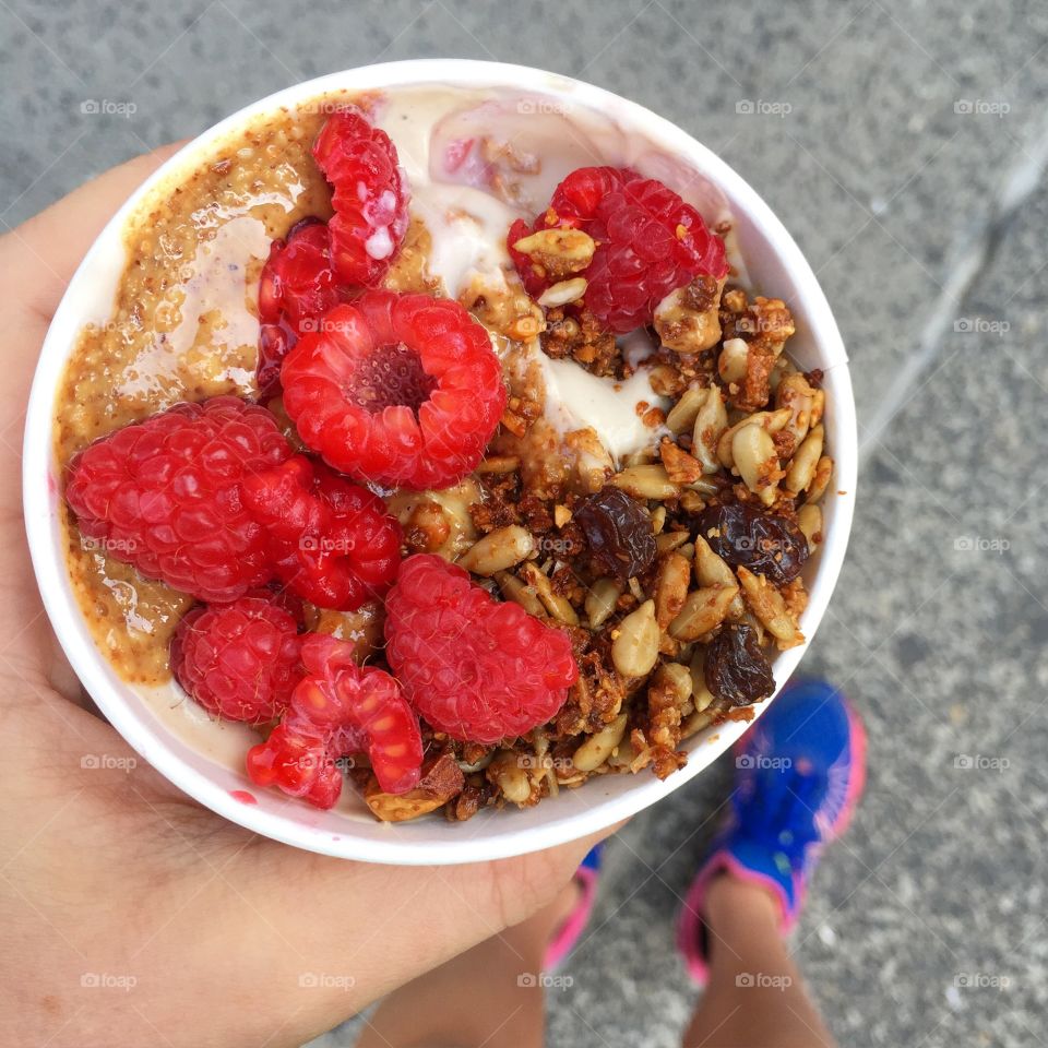 Breakfast bowl on the go. Vanilla chia pudding, taro pudding, cashew cream, almond butter, almond butter granola, raspberries 