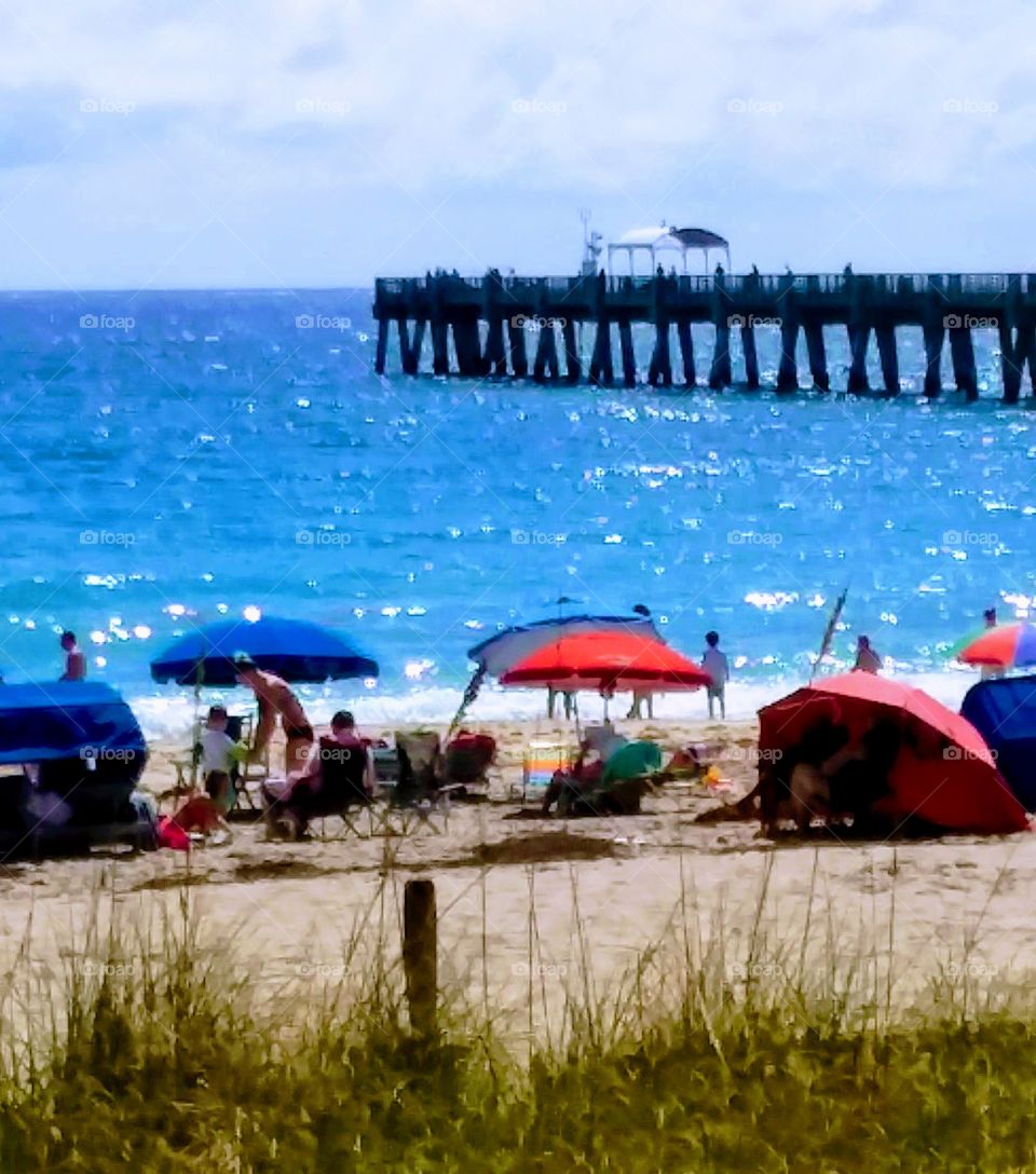 Beach scene with pier