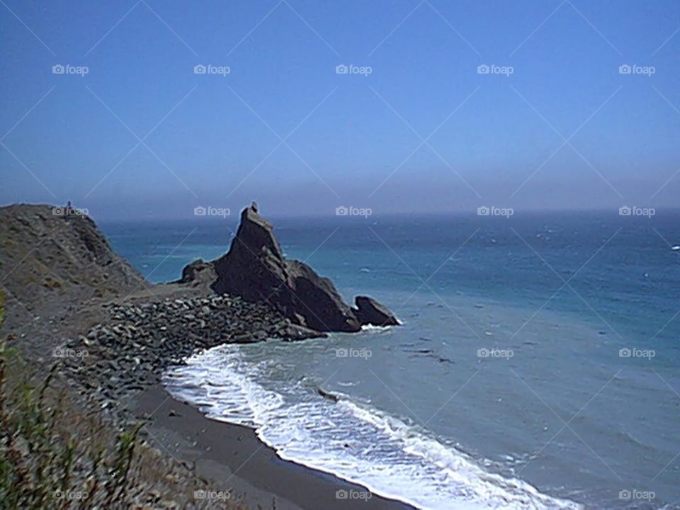 Shore line with a rocky point