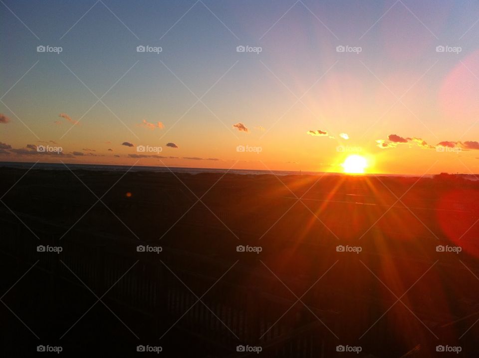 Sunset at Holden Beach, NC. A beautiful sunset over the ocean in Holden Beach, NC.