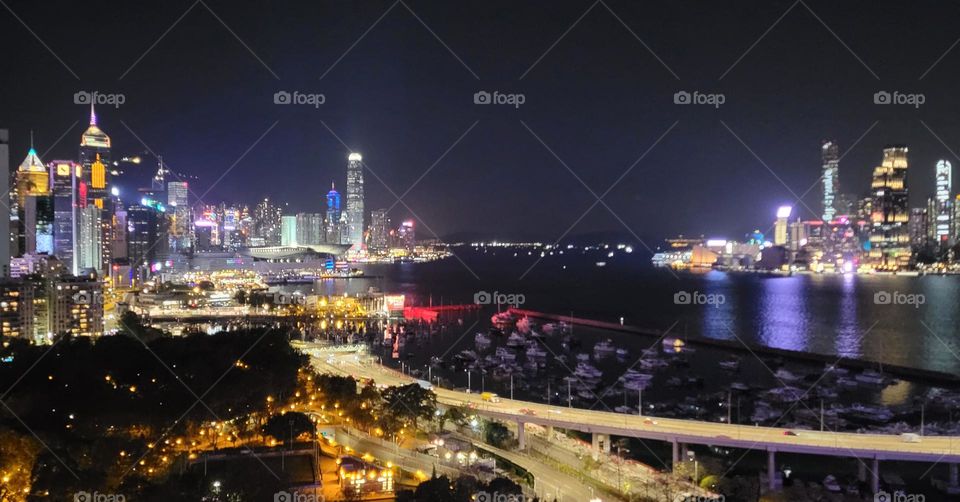 Rooftop night view of Victoria Harbour Hong Kong