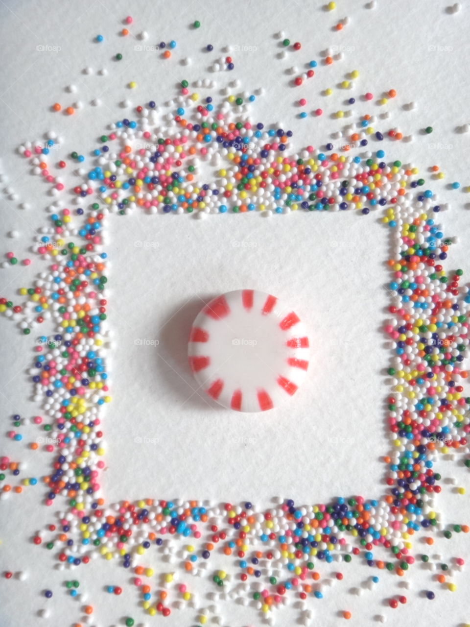 Christmas candy with sprinkle frame