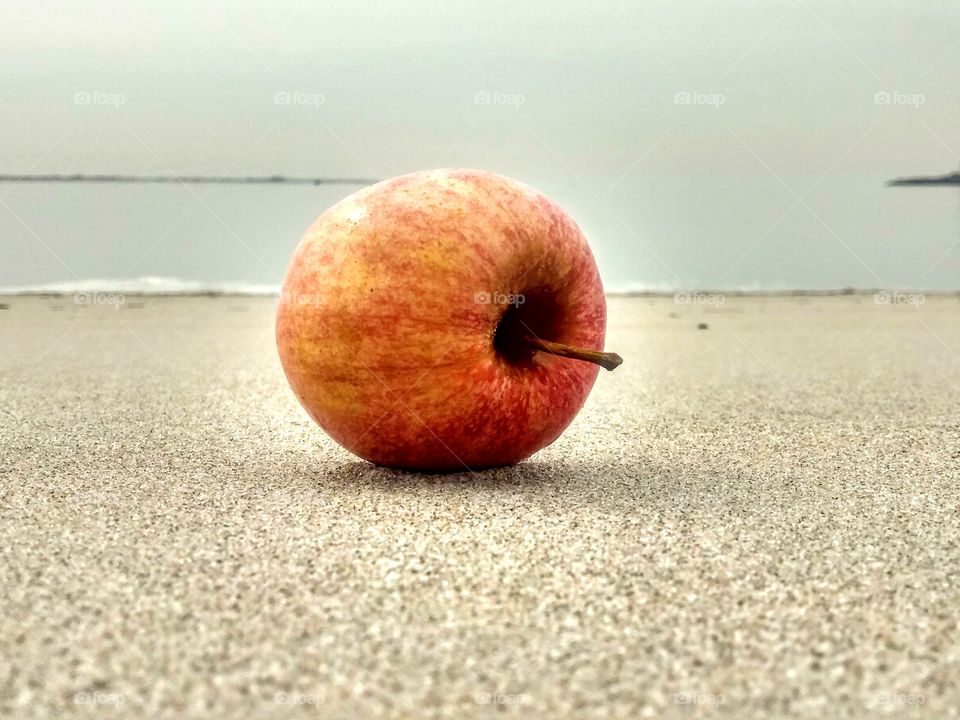 Apple on the beach