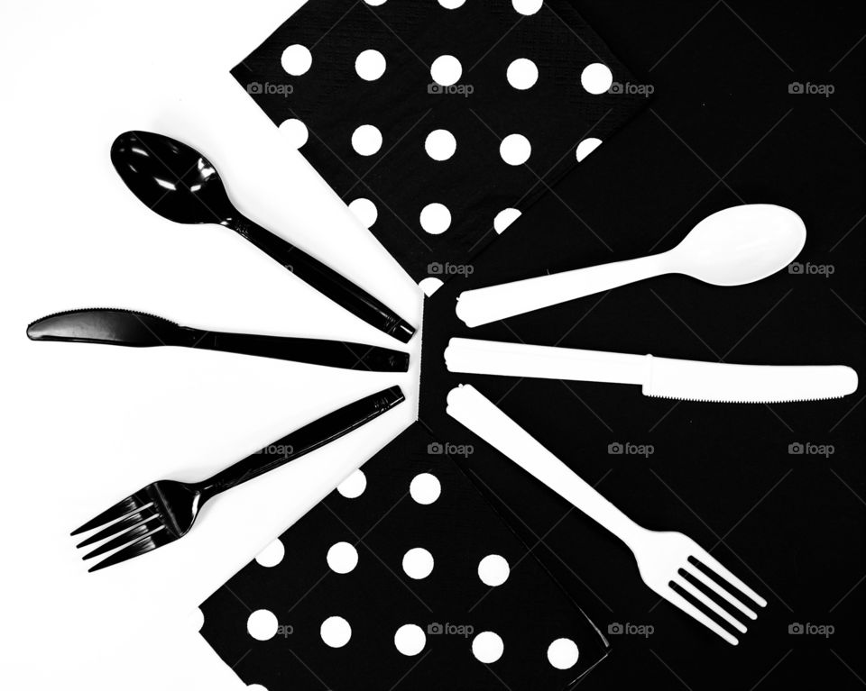 Black and White, opposites, plastic table service and napkins