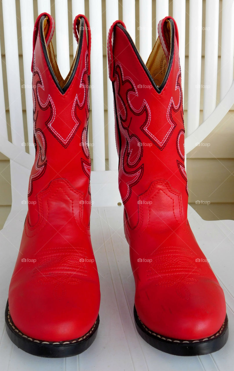 Red Cowboy Boots! The Red Story! Red is color of passion. It's the color that is always seen on heart decorations on     Valentine's Day! Red is astonishing, exhilarating, and fills your world through feelings and emotions! 