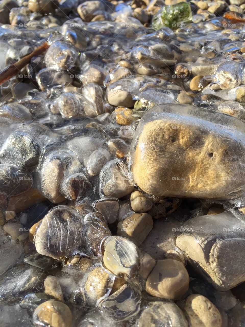 Frozen rocks on the lake 